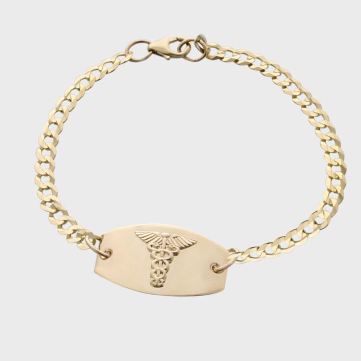 petite medical id bracelet in sterling silver, slightly curved medical id plate for comfortable fit, curb chain with claw clasp