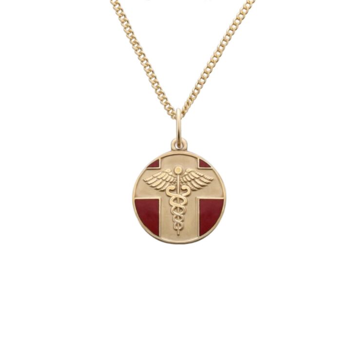 detail of gold and red, round, embossed, and vintage style medical id pendant on chain