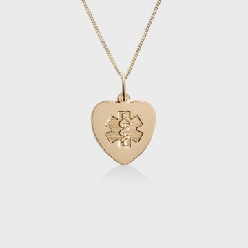 Heart-shaped gold pendant with embossed medical emblem