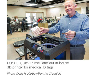 Our CEO, Rick Russell and our in-house 3D printer for medical ID  tags