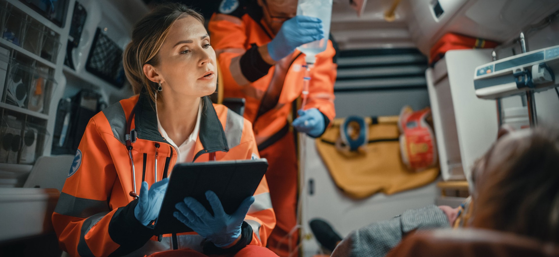 first responder assessing patient